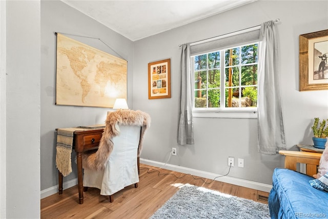 26351 Sheldon St, Kittredge, CO 80457 - sitting room with wood finished floors and baseboards