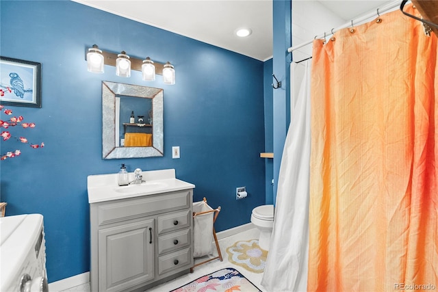 26351 Sheldon St, Kittredge, CO 80457 - full bath featuring vanity, toilet, baseboards, and a shower with curtain