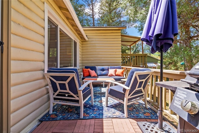 26351 Sheldon St, Kittredge, CO 80457 - wooden deck featuring an outdoor hangout area