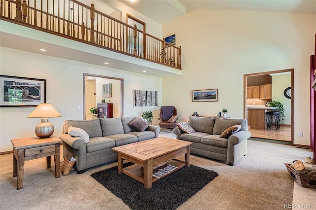 13837 W 59th Pl, Arvada, CO 80004 - living room featuring light colored carpet and high vaulted ceiling