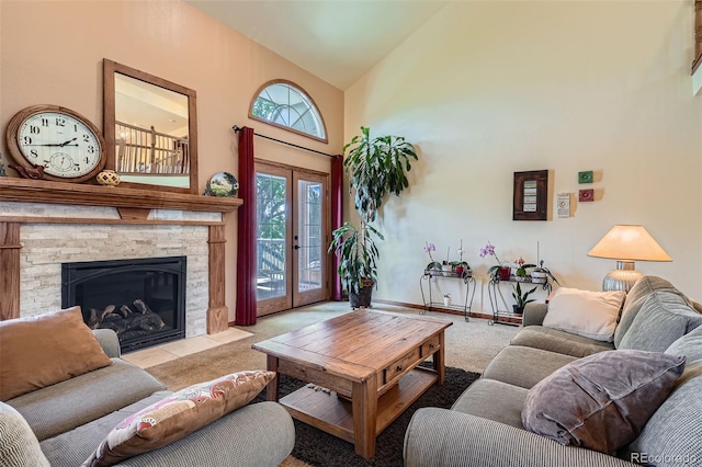 13837 W 59th Pl, Arvada, CO 80004 - living room with carpet floors, high vaulted ceiling, and a stone fireplace