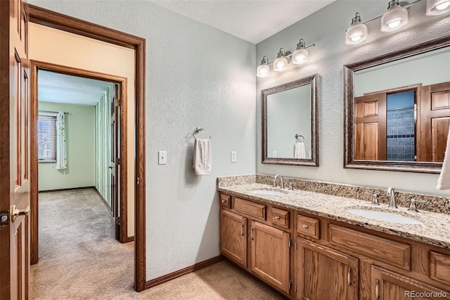 13837 W 59th Pl, Arvada, CO 80004 - full bath with double vanity and a textured wall