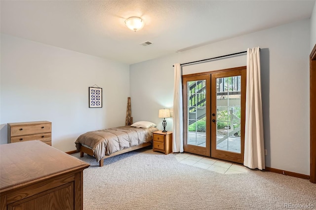13837 W 59th Pl, Arvada, CO 80004 - bedroom featuring access to outside, light colored carpet, and french doors