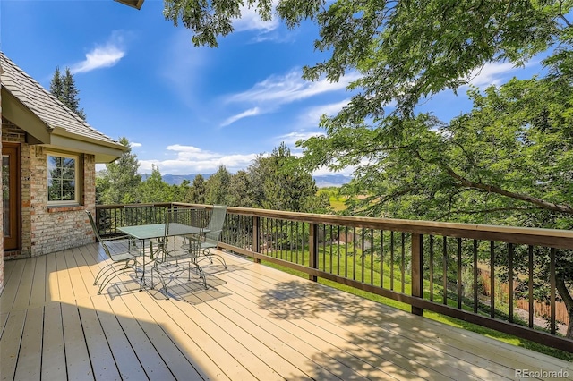 13837 W 59th Pl, Arvada, CO 80004 - wooden terrace featuring outdoor dining space