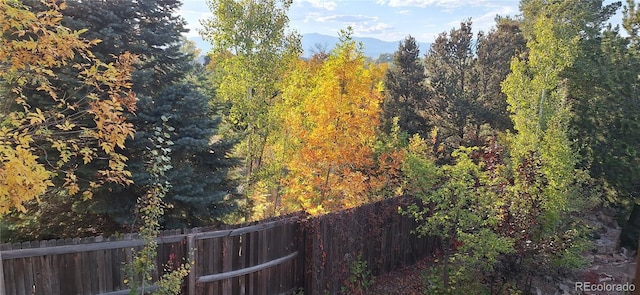 13837 W 59th Pl, Arvada, CO 80004 - view of yard with a view of trees and a mountain view