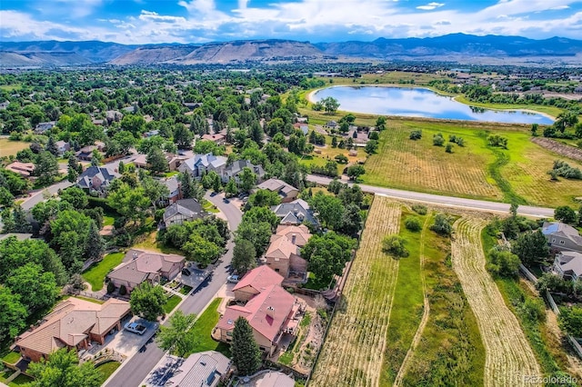 13837 W 59th Pl, Arvada, CO 80004 - aerial view of residential area with a water and mountain view