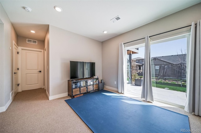 interior space with recessed lighting, visible vents, carpet flooring, and baseboards