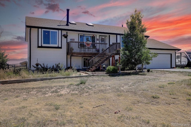 view of front of property with a garage