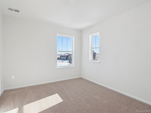 view of carpeted spare room