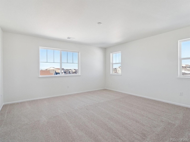 view of carpeted spare room