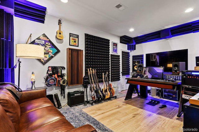 playroom with hardwood / wood-style flooring