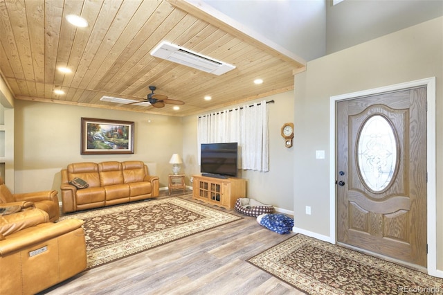 living area featuring baseboards, visible vents, wood ceiling, wood finished floors, and recessed lighting