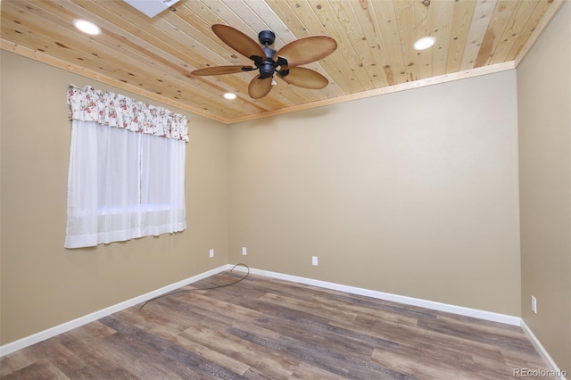 spare room featuring recessed lighting, wood ceiling, baseboards, and wood finished floors