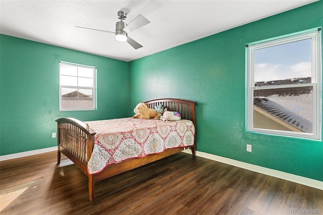 bedroom featuring ceiling fan and hardwood / wood-style floors