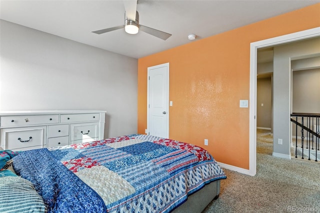 carpeted bedroom featuring ceiling fan