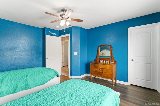 bedroom with hardwood / wood-style flooring and ceiling fan