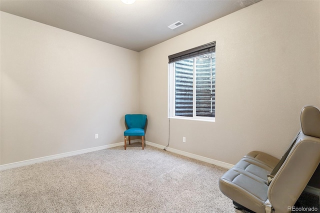 unfurnished room featuring carpet