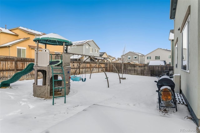 view of snow covered playground