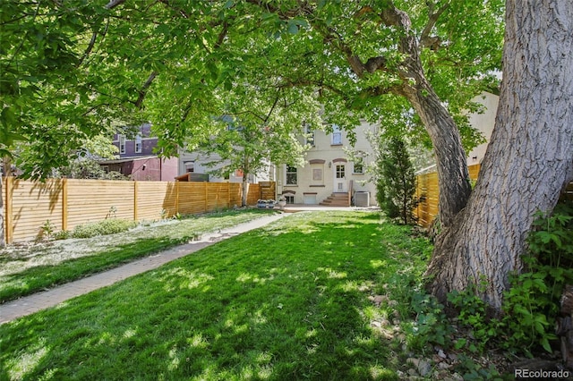 351 Bannock St, Denver, CO 80223 - fenced backyard featuring entry steps