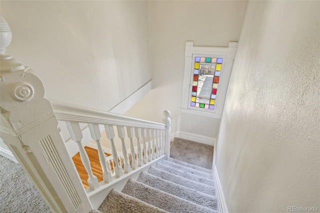 351 Bannock St, Denver, CO 80223 - staircase featuring carpet and baseboards
