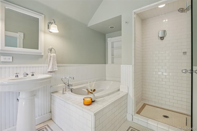 351 Bannock St, Denver, CO 80223 - bathroom featuring a garden tub, tile patterned floors, a stall shower, and lofted ceiling