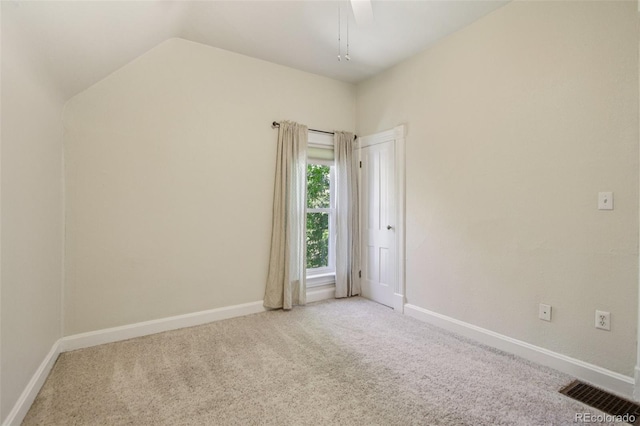 351 Bannock St, Denver, CO 80223 - spare room featuring carpet flooring, vaulted ceiling, and ceiling fan