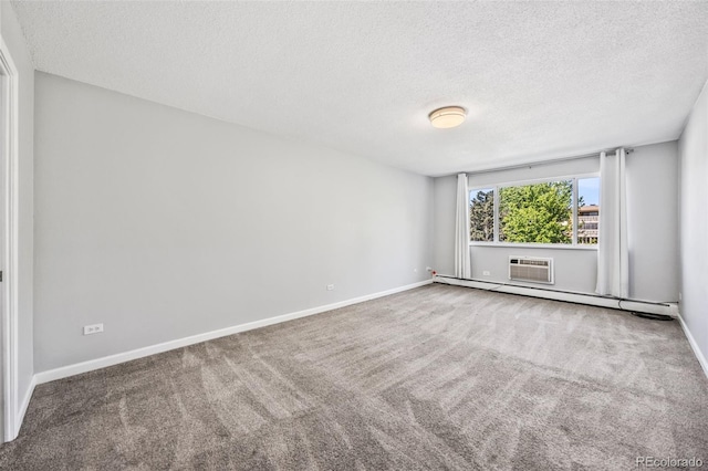 610 S Alton Way Unit 7C, Denver, CO 80247 - carpeted spare room featuring a textured ceiling, an AC wall unit, and baseboard heating