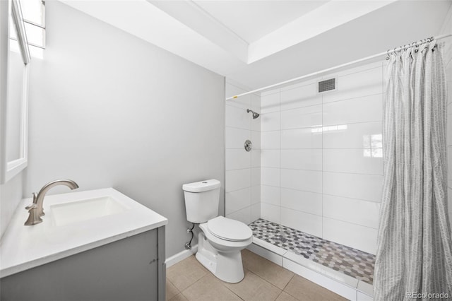 610 S Alton Way Unit 7C, Denver, CO 80247 - bathroom featuring vanity, tiled shower, and tile patterned floors