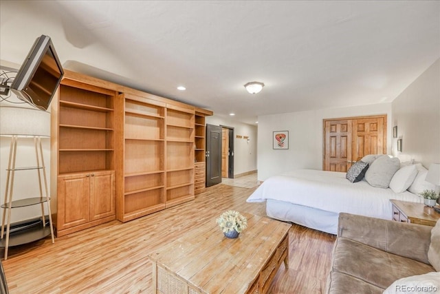 189 Ten Mile Cir Unit 551, Frisco, CO 80443 - bedroom with light wood-type flooring, recessed lighting, and baseboards