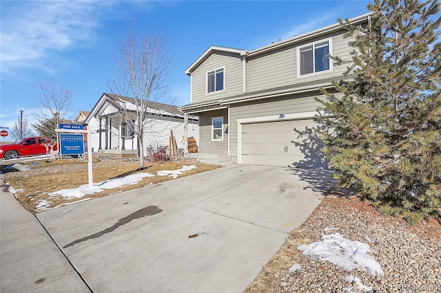 view of front of property featuring a garage