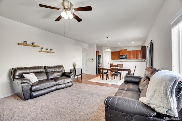 living room featuring ceiling fan