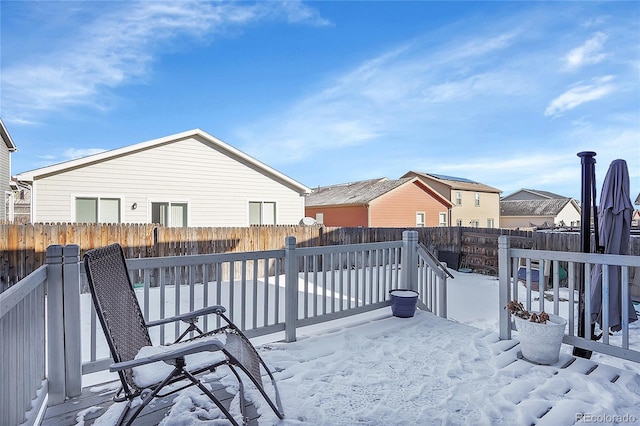 view of snow covered deck