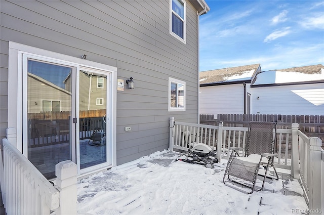 view of snow covered deck