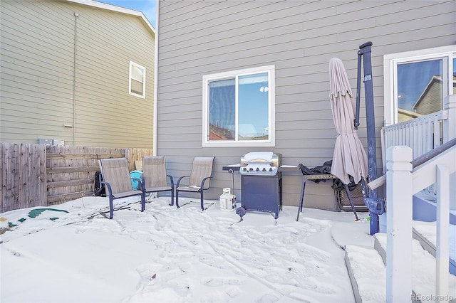 view of snow covered patio