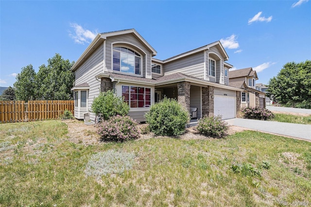 17464 Crestview Ct, Monument, CO 80132 - traditional home with a garage, concrete driveway, and brick siding