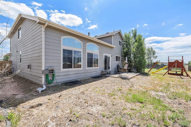 17464 Crestview Ct, Monument, CO 80132 - back of property featuring a patio and a playground