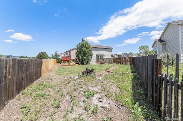 17464 Crestview Ct, Monument, CO 80132 - fenced backyard featuring a playground