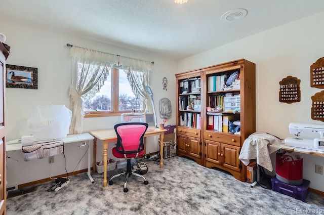 carpeted office with baseboards