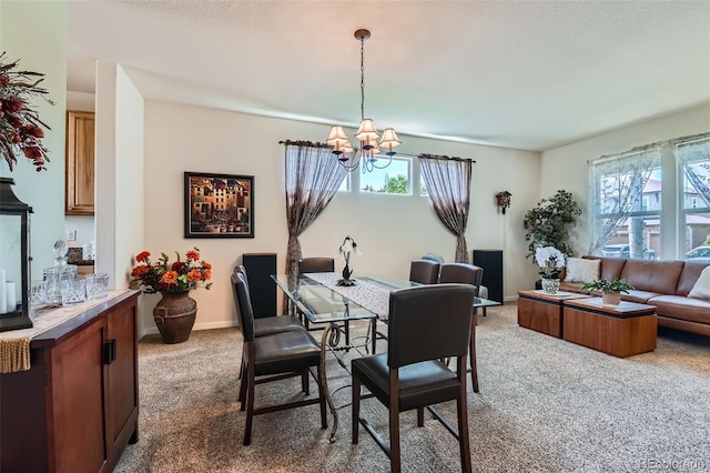 13962 Dexter Way, Thornton, CO 80602 - dining area with carpet, a chandelier, and plenty of natural light