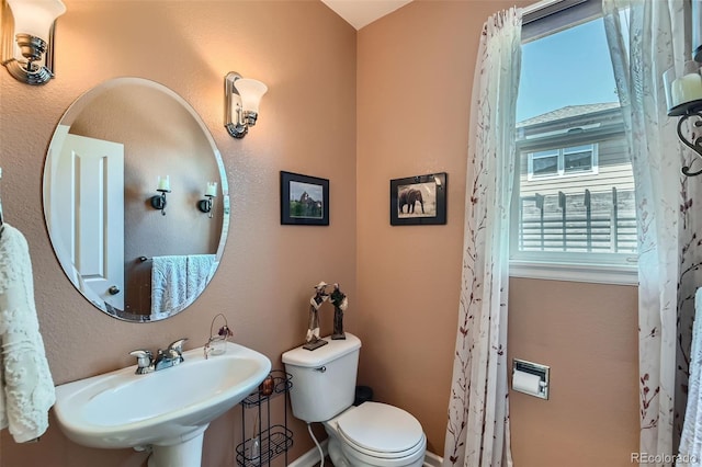 13962 Dexter Way, Thornton, CO 80602 - bathroom featuring healthy amount of natural light