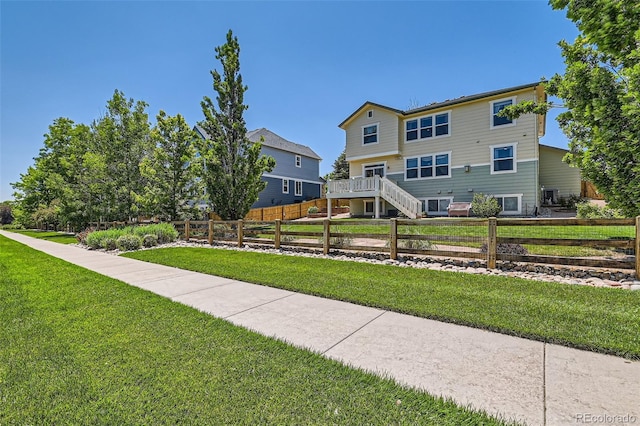 13962 Dexter Way, Thornton, CO 80602 - view of front of property featuring stairway and a wooden deck