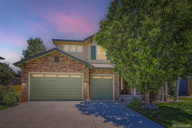 13962 Dexter Way, Thornton, CO 80602 - view of front of home with driveway and stone siding