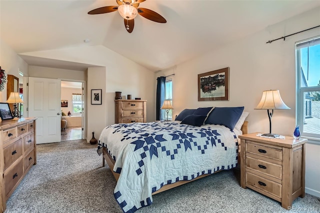 13962 Dexter Way, Thornton, CO 80602 - bedroom featuring lofted ceiling, light carpet, ceiling fan, and ensuite bath