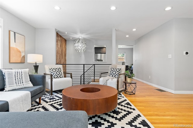 4451 Eliot St, Denver, CO 80211 - living room featuring recessed lighting and light wood-type flooring