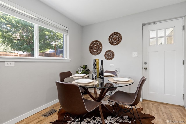 4451 Eliot St, Denver, CO 80211 - dining area featuring light wood-style floors