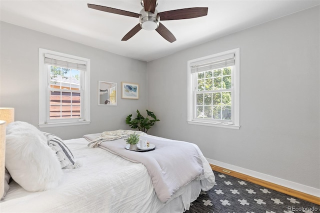 4451 Eliot St, Denver, CO 80211 - bedroom with wood finished floors and ceiling fan