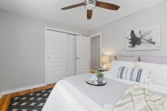 4451 Eliot St, Denver, CO 80211 - bedroom featuring a closet, wood finished floors, and a ceiling fan