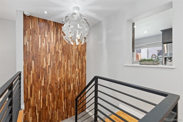 4451 Eliot St, Denver, CO 80211 - stairway with a chandelier and recessed lighting