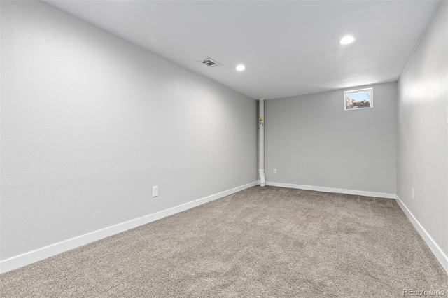 4451 Eliot St, Denver, CO 80211 - carpeted spare room with baseboards and recessed lighting