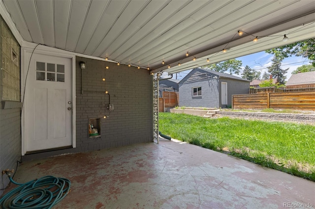 4451 Eliot St, Denver, CO 80211 - view of patio / terrace featuring an outbuilding